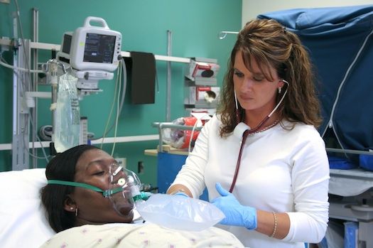 nurse_administering_oxygen_to_patient