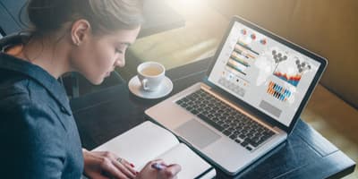 Woman studying on a laptop