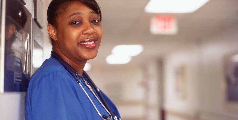 Nurse Taking A Break in Hallway