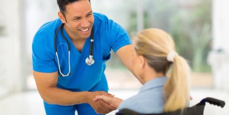 Male Nurse Discharging Patient