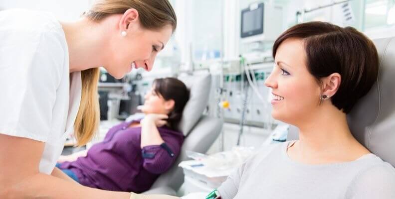 Nurse Drawing Blood from Patient