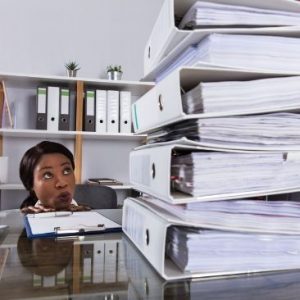 nurse_with_stack_of_paperwork